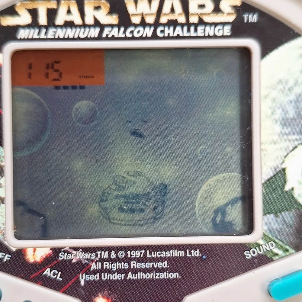 Star Wars Millennium Falcon Handheld Game - White